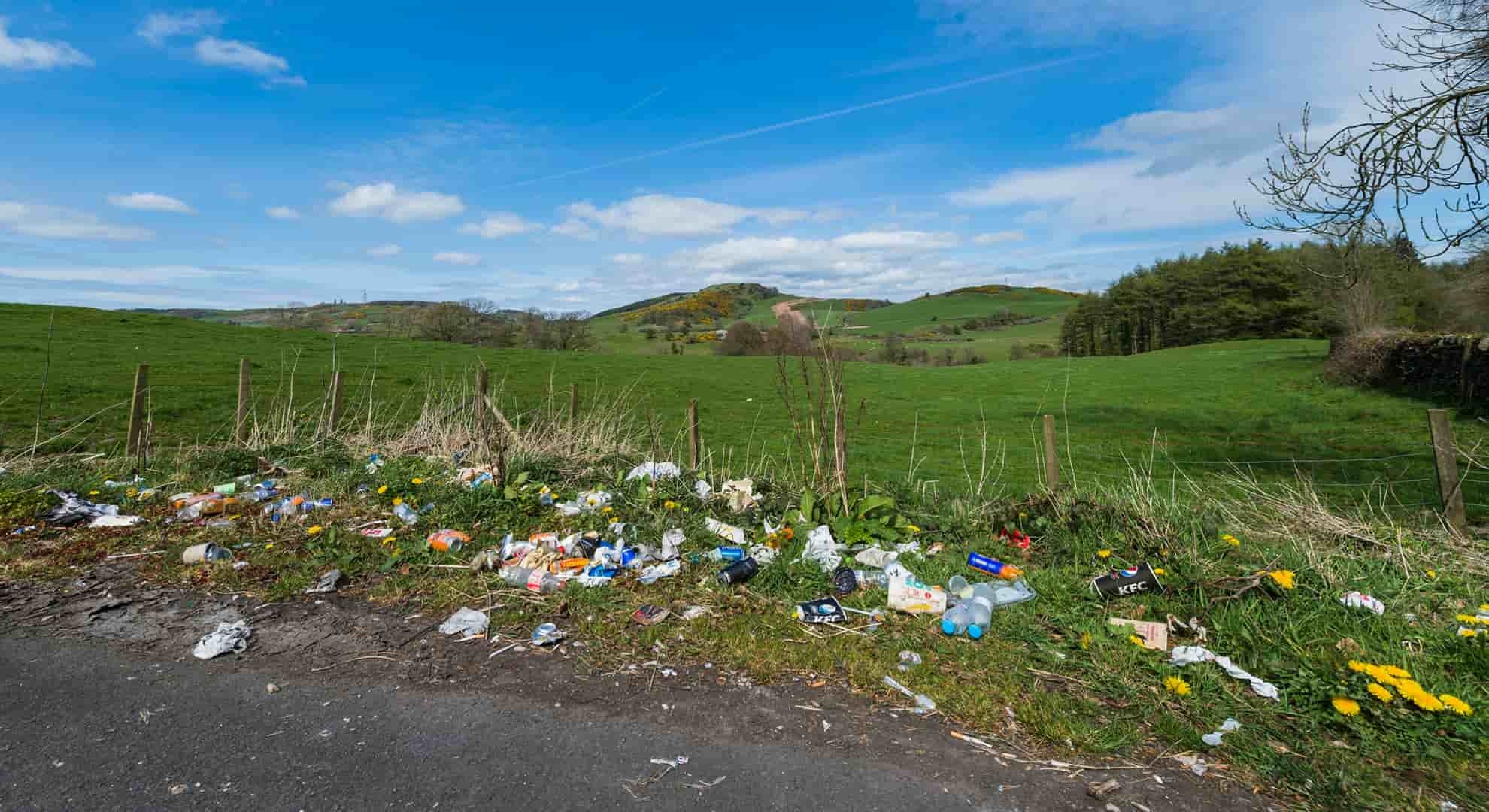 discarded litter at the side of a rural road in Scotland