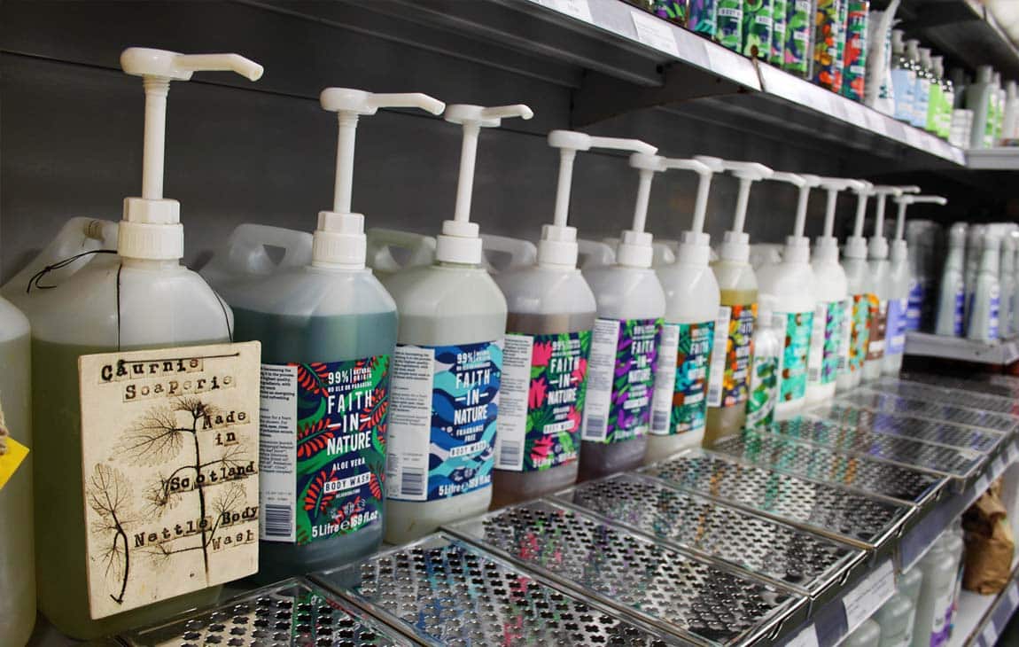 Photo of cleaning product dispensers at a zero waste refill store
