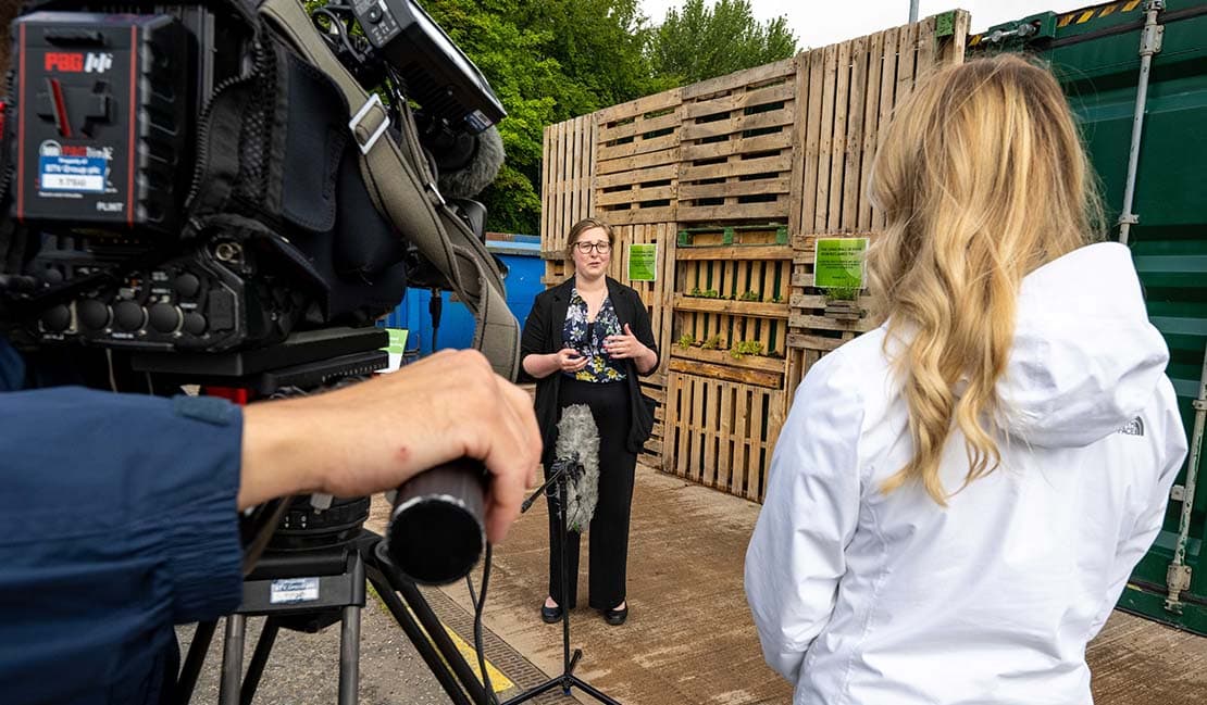 Photo of a television interview at Hazlehead Reuse Shop in Aberdeen funded by the Recycling Improvement Fund